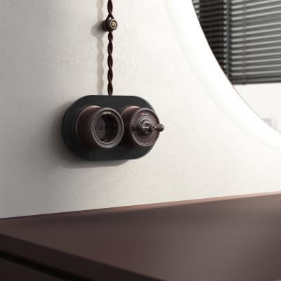 Фото Розетка с заземлением Werkel Ретро W5671014 коричневый