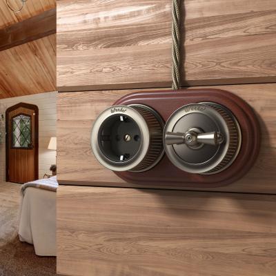 Фото Переключатель/выключатель одноклавишный Werkel Ретро W5712012 бронзовый