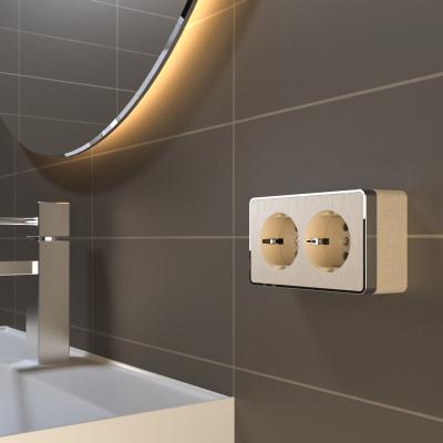 Фото Розетка двойная с заземлением Werkel Gallant W5072110 шампань рифленый